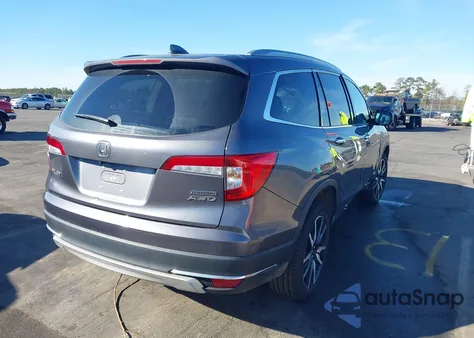 2020 Honda Pilot Awd Touring 8 Passenger z USA, uszkodzony, nr VIN 5FNYF6H91LB033022